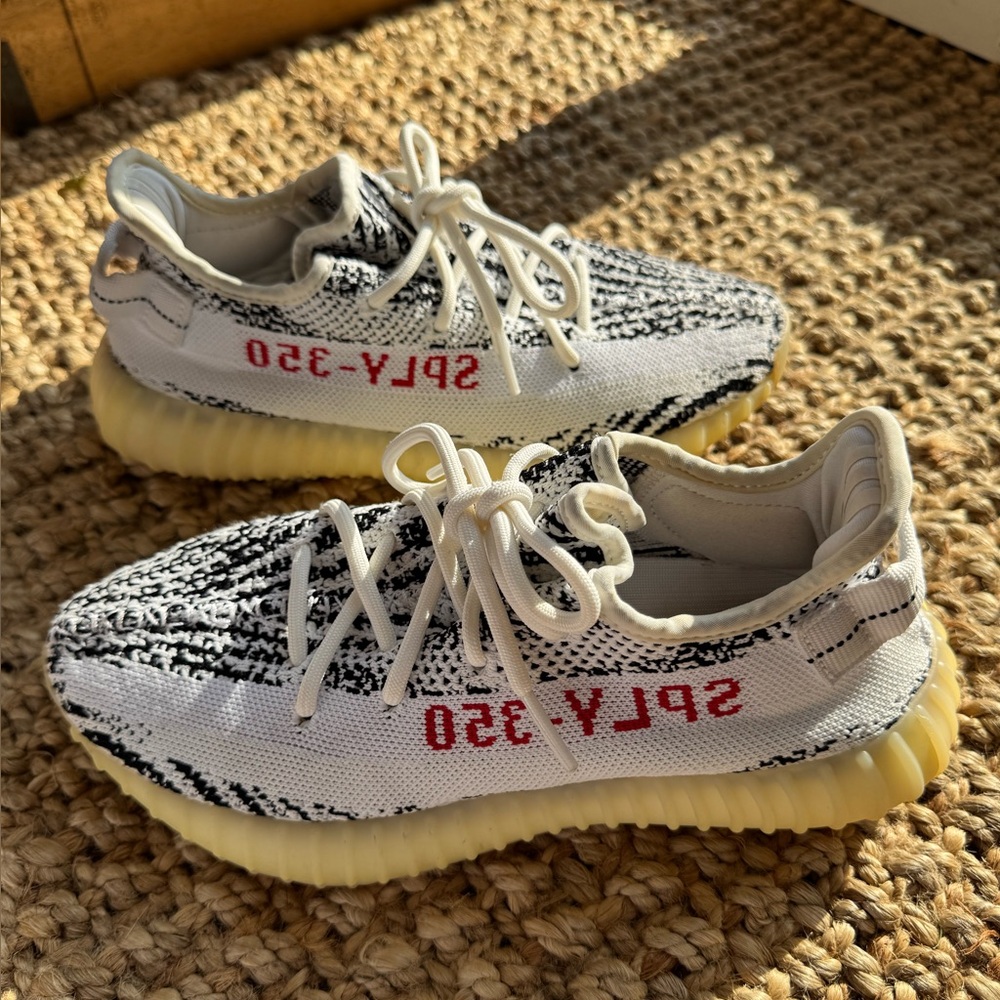Yeezy Adidas Black, White, and Red Patterned Sneakers